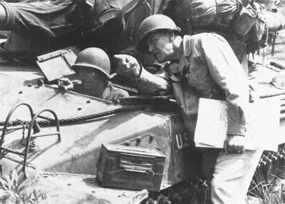 Major General A.D. Bruce (standing) during World War II